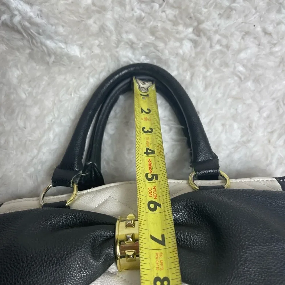 Betsey Johnson off white & Black quilted faux leather satchel with bow accent
